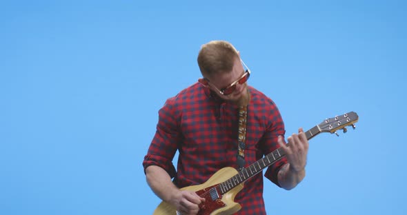 Rock Musician Playing Electric Guitar