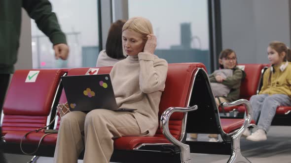 Woman Waiting In Departure Lounge