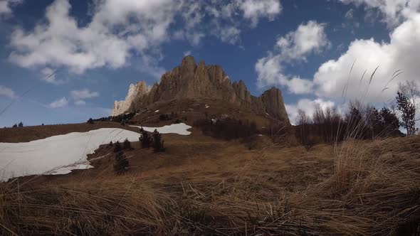 Beautiful layers of clouds and play of shadows on the rock.