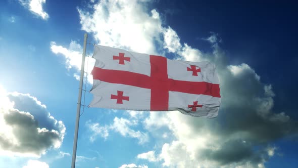 Flag of Georgia Waving at Wind Against Beautiful Blue Sky