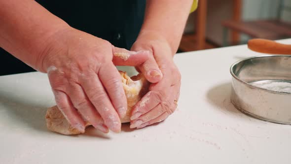 Woman Hands Forming Loaf of Bread
