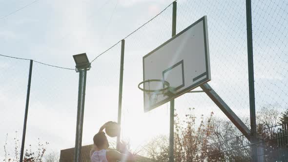 Ball missing basketball hoop