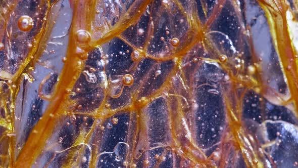 Pouring Honey on Orange Shooting Close Up