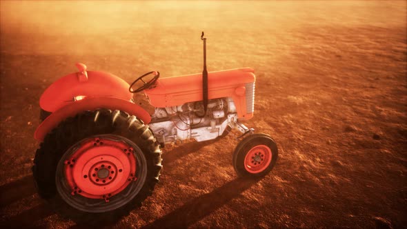 Vintage Retro Tractor on a Farm in Desert