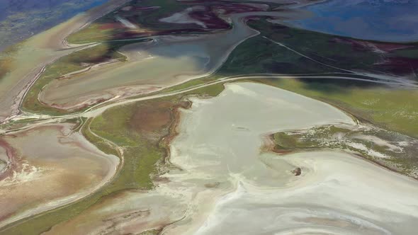 Beautiful flight in summer over salt lakes, Dry lakes, Green grass