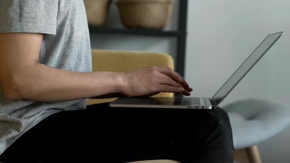 Close-Up of Women's Hands Typing on a Laptop, Doing Online Training or Business, Doing Work At Home