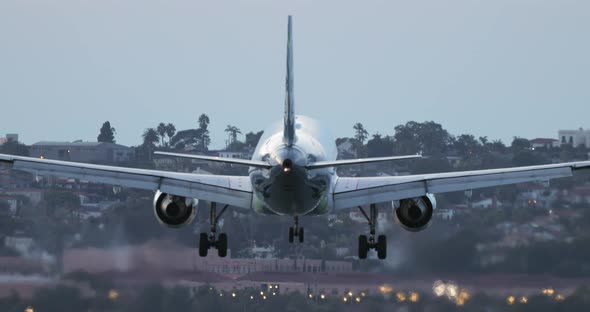 Cinematic Back Rear View of Landing Big Airplane  Footage for Tourism Business