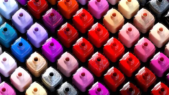 Multi-colored nail polish bottles arranged by shade Seamless animation. 4k HD