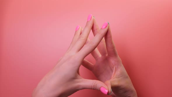 Woman's Hands Performing Brain Stimulating Hand Exercise