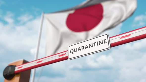 Barrier Gate with QUARANTINE Sign Opens at Flag of Japan alt