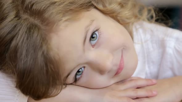 Beautiful little girl with long blonde hair