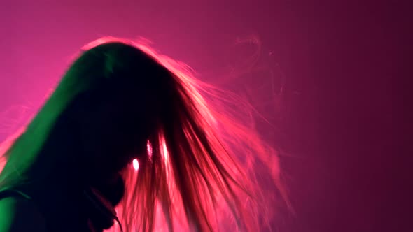 Sexy Blonde Dj Girl Playing and Listening To Music, Flipping Hair, Smoke, Silhouette, Pink Backlight