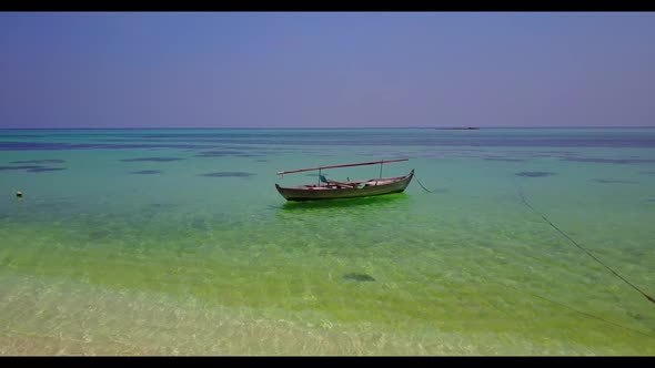 Aerial top view abstract of exotic coastline beach vacation by aqua blue lagoon and white sandy back