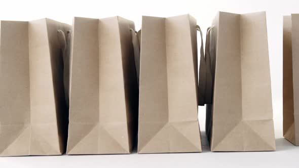 Brown shopping bags on white background