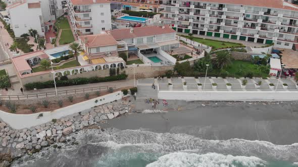 Spain Malaga Nerja beach on a summer cloudy day using a drone and a stabilised action cam.shoots of