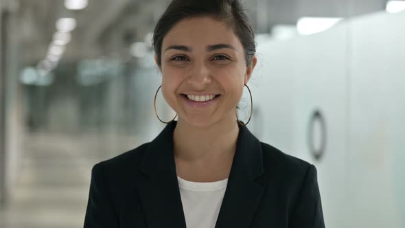 Smiling Indian Businesswoman Looking at Camera 
