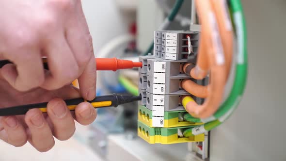 the Engineer Measures the Voltage in the Electrical Appliance