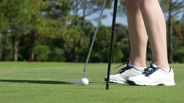 Golfer playing golf