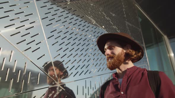 Young Man Walking in Urban Area