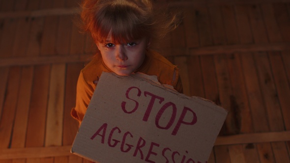 Afraid Homeless Toddler Girl Sitting Holding Inscription Stop Aggression Hiding From Bombing Attack