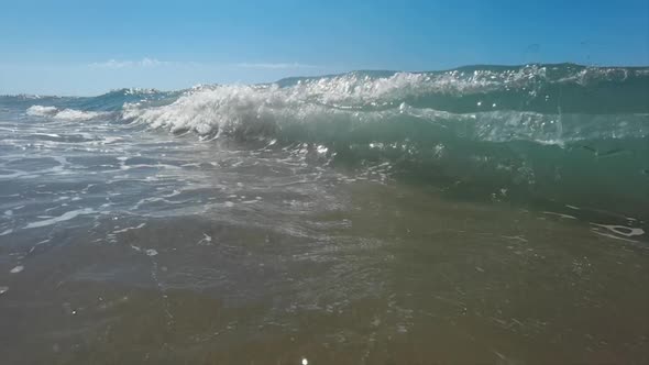 Slow Motion Footage of Sea Waves Breaking on Shore