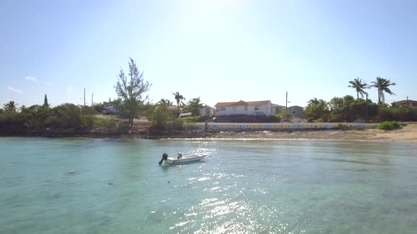 Aerial drone view of a fishing motor boat in the Bahamas, Caribbean