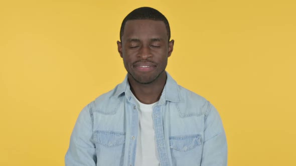 Young African Man Yes By Head Shake Yellow Background