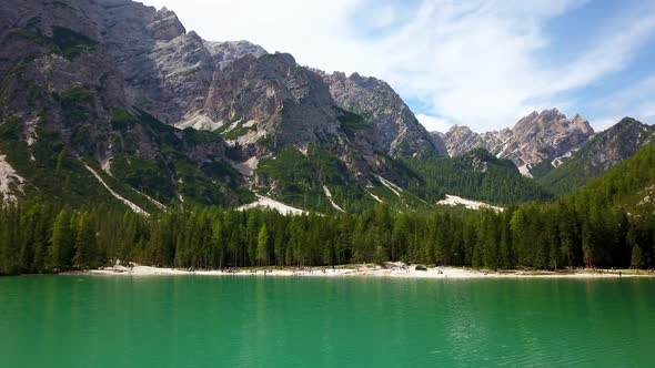 Lake Braies aka Pragser Wildsee in South Tyrol Italy, Aerial tilt up reveal shot