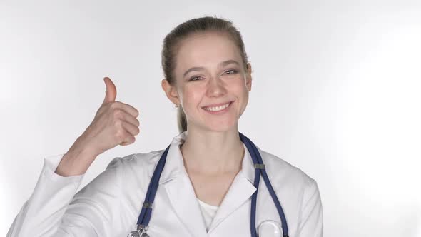 Portrait of Young Lady Doctor Gesturing Thumbs Up