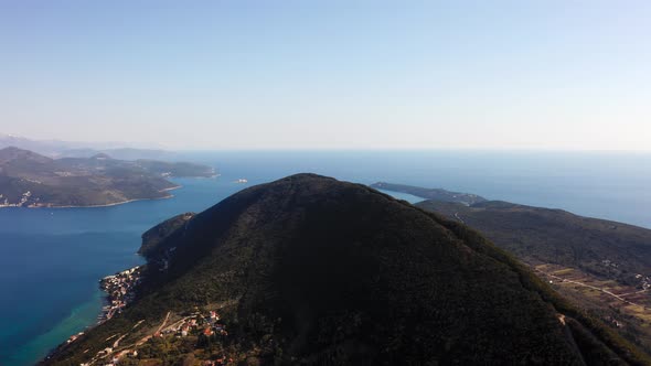 aerial flyover on the mountain delimiting the land border between Montenegro and Croatia, on the Bay