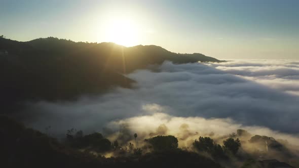 Scenic Landscape on Early Morning with Golden Sun Rising Above Malibu Mountains