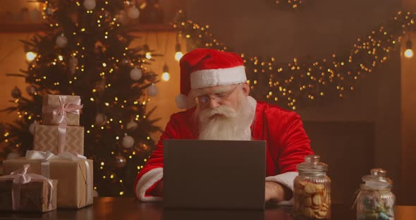 Real Santa Claus Using New Technology for Communication with Children, Receiving Mail or Wish List