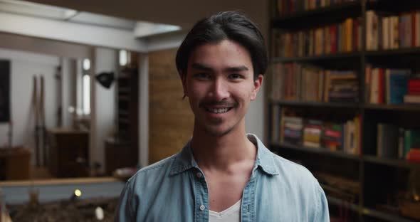 Mixed race man looking at camera and smiling