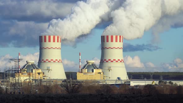 Cooling towers of Nuclear power plant emissions of steam in the air atmosphere