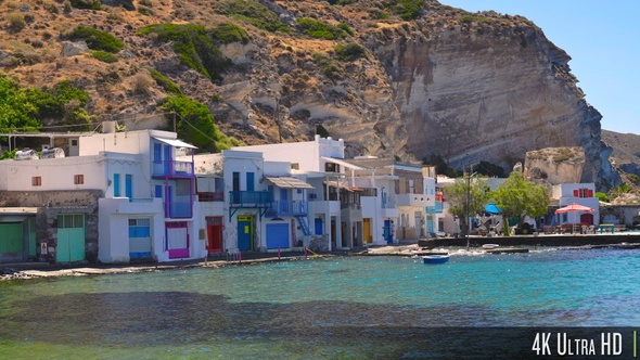 4K Fishing houses of Klima village next to dramatic cliffs on Milos island in Greece