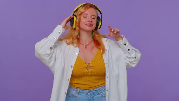 Cheerful Attractive Girl Listening Music Via Headphones and Dancing Disco Fooling Around Having Fun