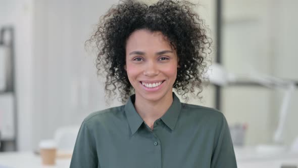 African Woman Smiling Camera