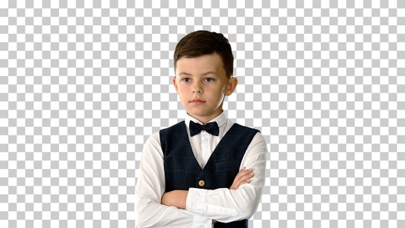 Young boy in bow tie and vest with crossed, Alpha Channel