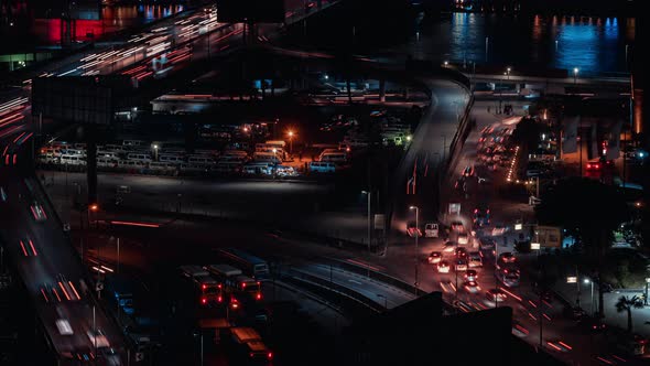 Modern Night City with Cars Buildings Street Lamps