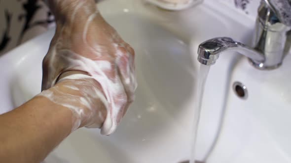 Man Washing Hands with Soap