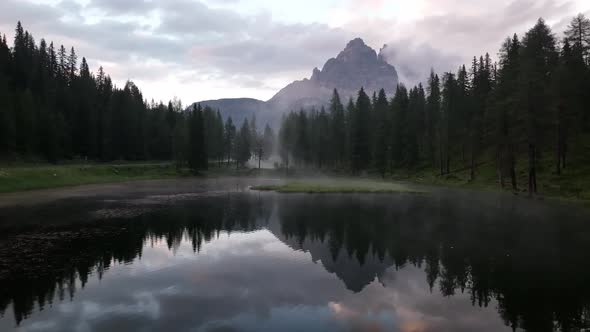 Mountain lake in the Dolomites with Tre Cime di Lavaredo reflection