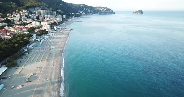 Drone aerial shot of the italian shore with beaches, in Genoa