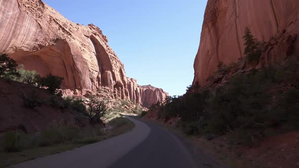 Driving on the Burr Trail as the road cuts through the canyon