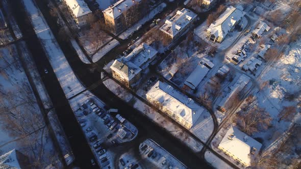 Old Buildings and Wide Avenue in City at Bright Sunset