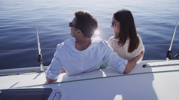 Young couple on sailboat together. Shot on RED EPIC for high quality 4K, UHD, Ultra HD resolution.