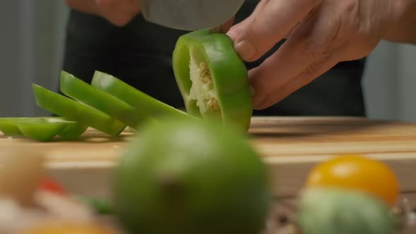 Professional Chef Cuts Green Bell Pepper