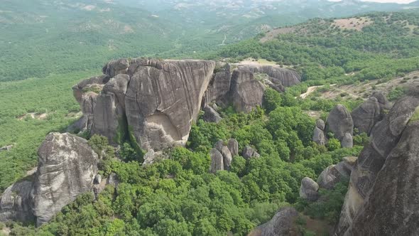 Flying over Meteora rock formations and monasteries in Greece