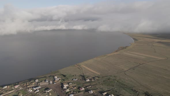 Aerial view of Lake Paravani and the village Poka. Georgia