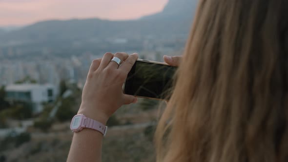 Woman Make Photos of City Landscape View