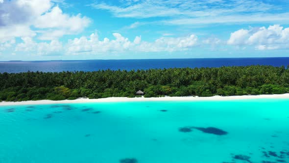 Beautiful above island view of a white sandy paradise beach and aqua blue water background in colorf